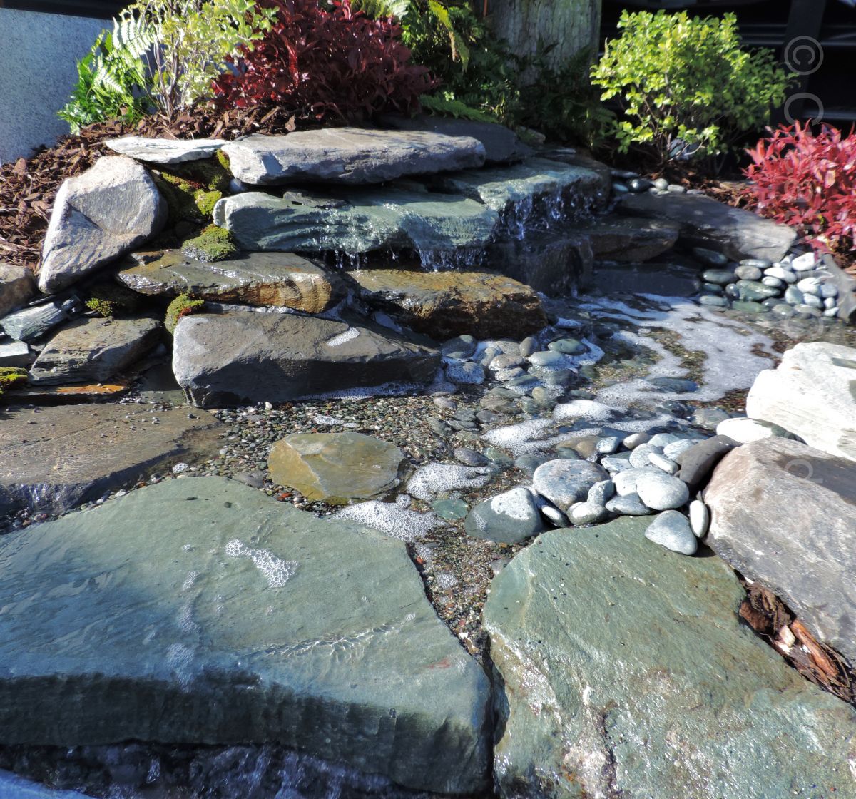 Small waterfall with stream  - Landscaping and Water Features -  Creative Cascades