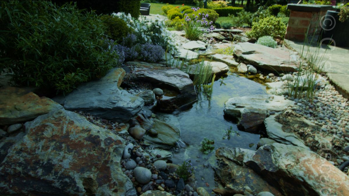 Small stream with low waterfall seen from waterfall top, Hertfordshire  - Landscaping and Water Features -  Creative Cascades