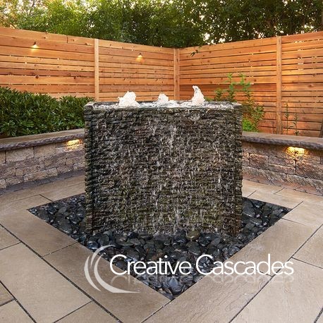 An example of our off-the-shelf water walls, these aren't real stone but are built to last  - Landscaping and Water Features -  Creative Cascades