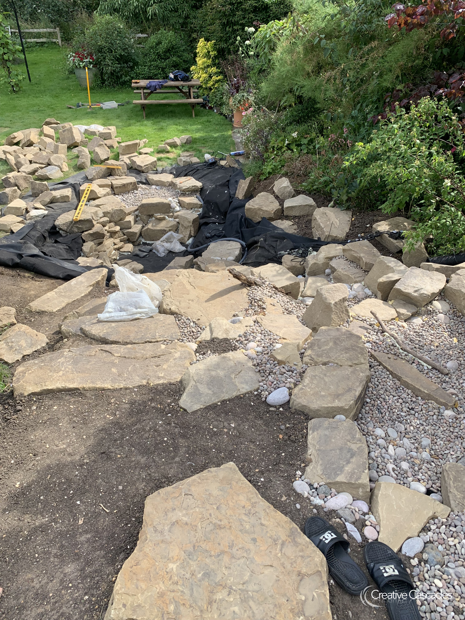 Constructing a new waterfall and eco-pond  - Landscaping and Water Features -  Creative Cascades