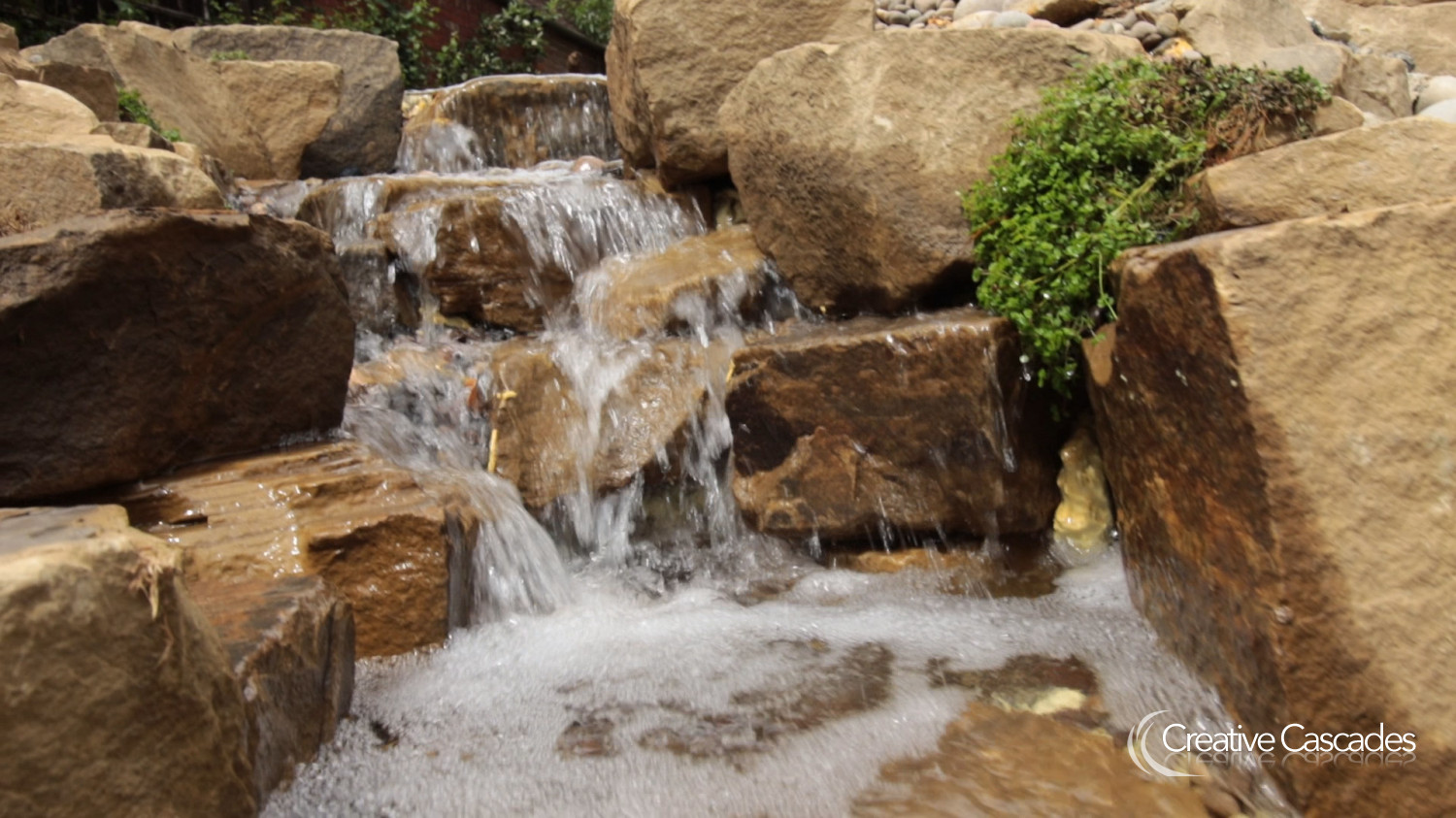Freshly built waterfall close-up  - Landscaping and Water Features -  Creative Cascades