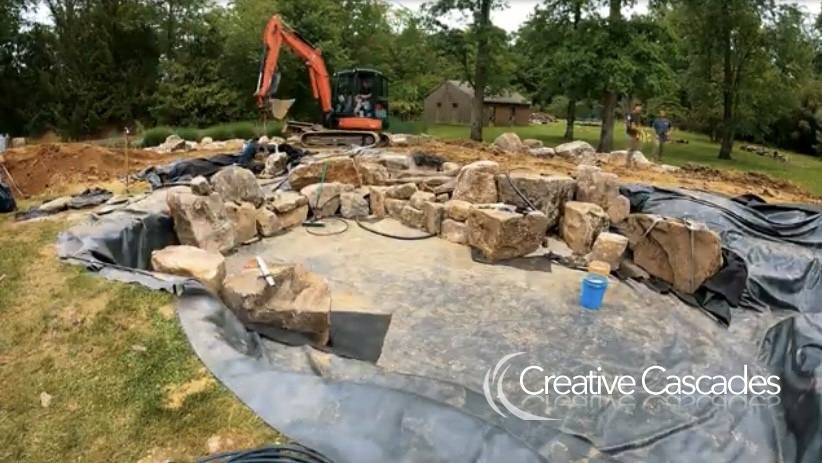 Building a large eco-system pond in Suffolk. These rocks are the most expensive of all types of rock available as at Autumn 2022.  - Landscaping and Water Features -  Creative Cascades