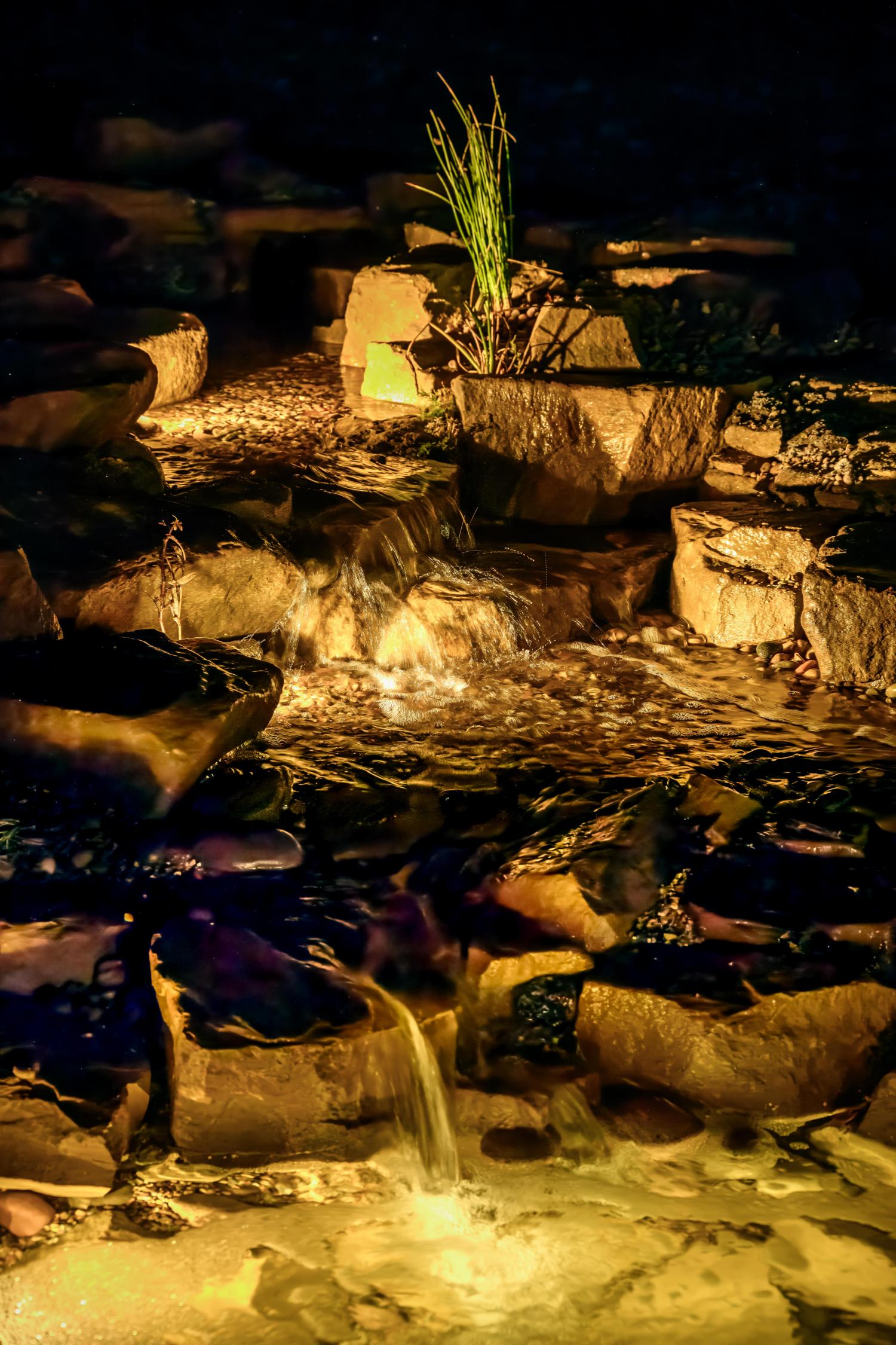 New cascades build in late 2023, under water lighting makes for an enchanting atmoshpere  - Landscaping and Water Features -  Creative Cascades